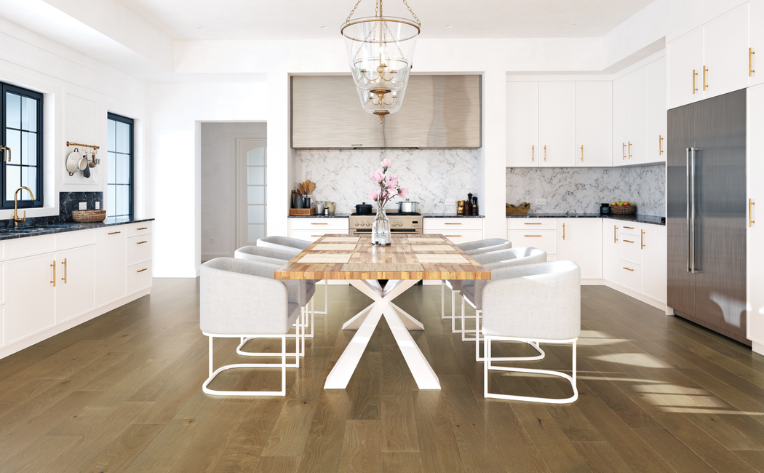 wood flooring in open concept kitchen with large dining table